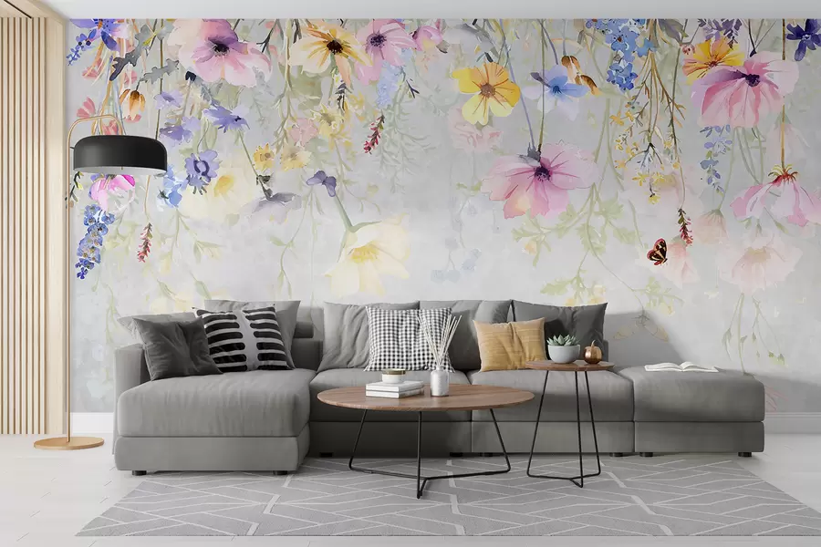 Fotobehang Kleurrijke bloemen met roze, gele en blauwe bloemen die van bovenaf op een gestructureerde grijze achtergrond hangen w08309