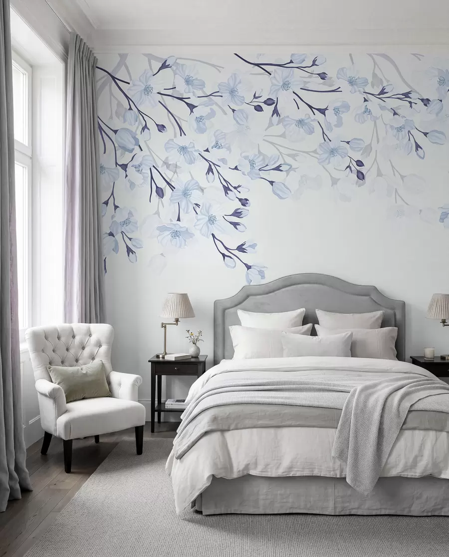 Fotobehang blauwe bloeiende takken op een blauwe achtergrond w02200v1