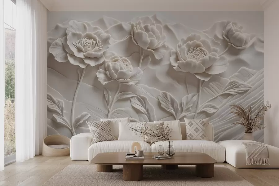 Fotobehang Een witte bloemenimitatie van reliëfsculptuur met grote, gedetailleerde pioenbloemen tegen een effen achtergrond w08612