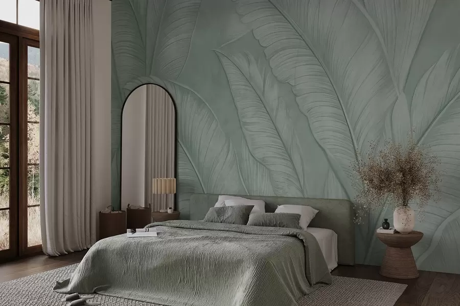 Fotobehang Gedetailleerde grote tropische bladeren in een monochrome groene kleur in loftstijl met een hoge textuur  w08772v1