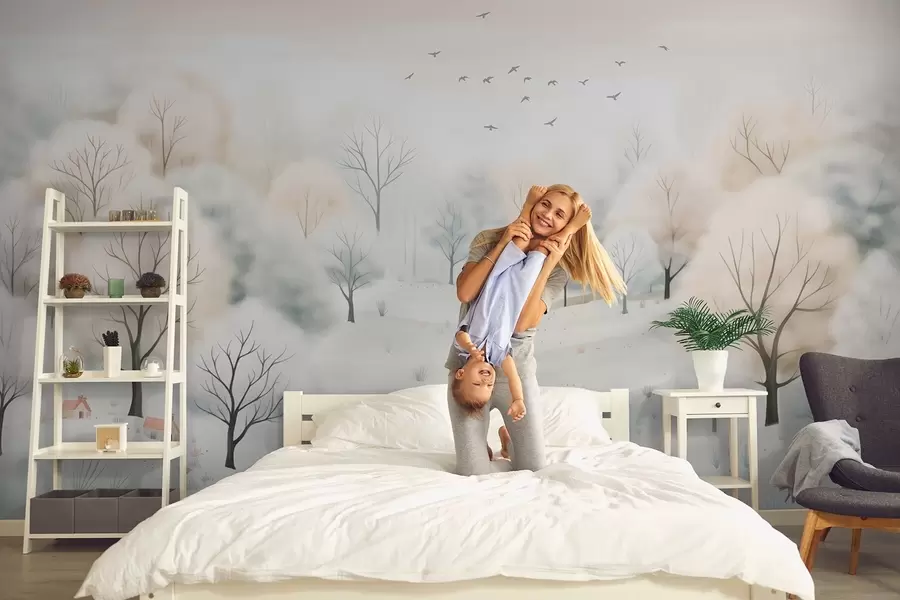 Fotobehang Winterbos met bomen, kleine huisjes, vogels en sneeuw in een lichte aquarelstijl w08815