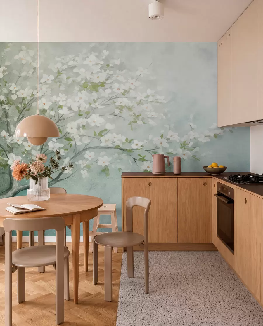 Fotobehang Een bloeiende boom met witte bloemen in volle bloei, tegen een korrelige achtergrond met ruisende structuur van gedempt blauw en groen w09261