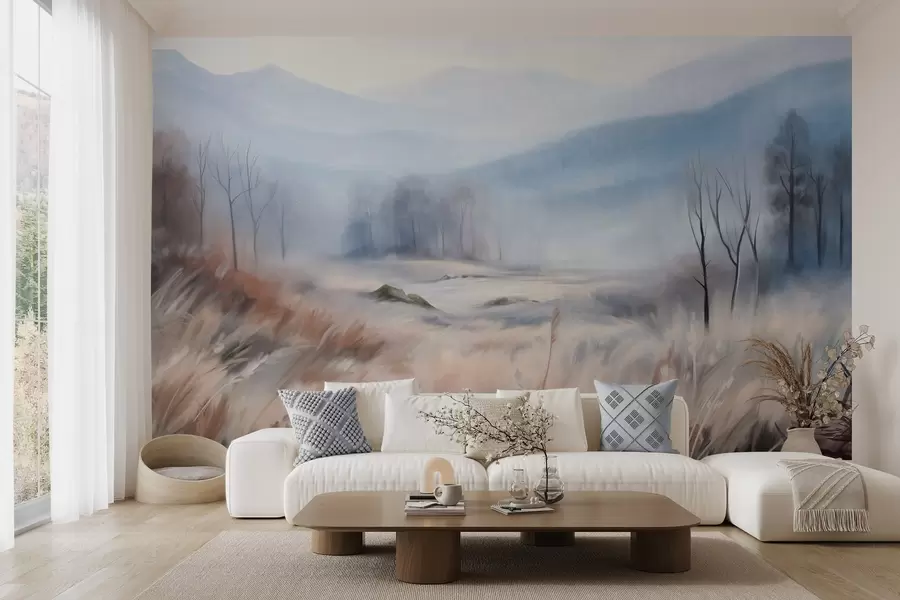 Fotobehang Getextureerd landschap met droog gras op de voorgrond en bomen op de achtergrond, met bergen in de verte w09542