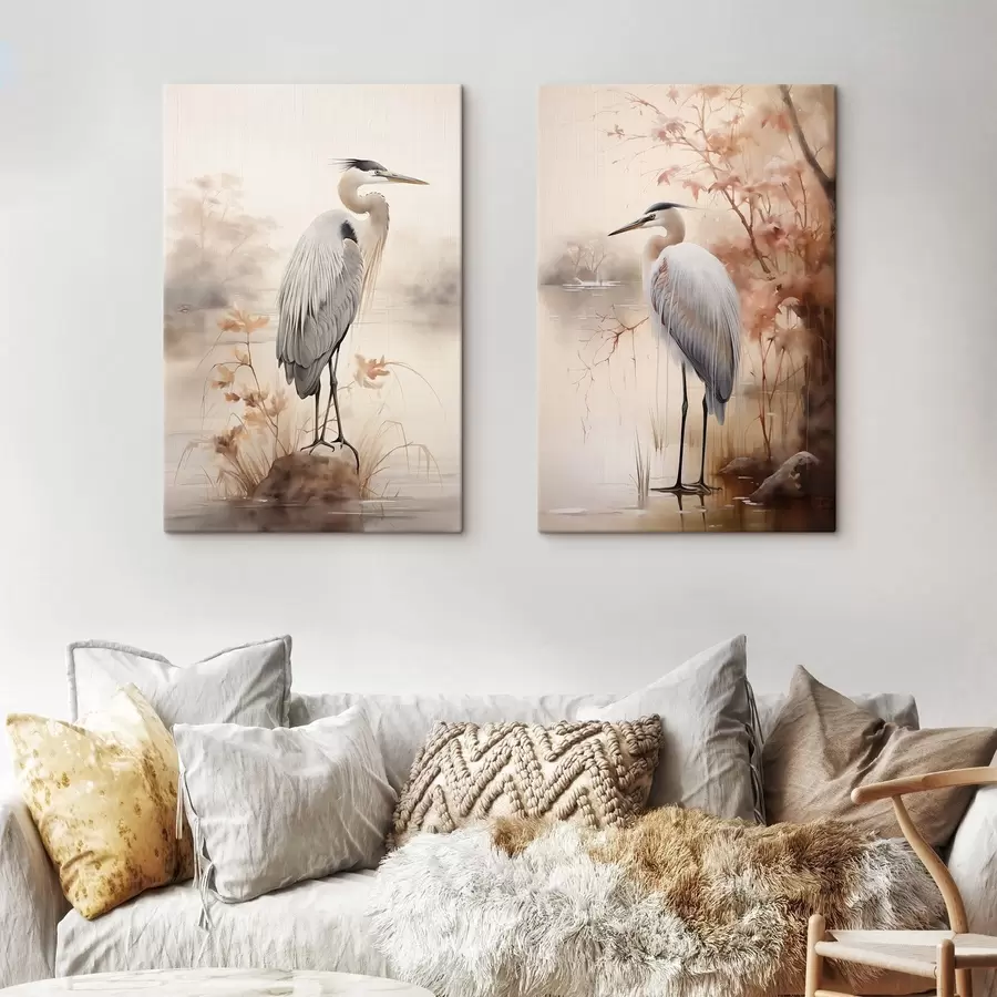  Schilderijen Een reiger staat op een rots in een meer met hoog gras en bomen op de achtergrond. m01239