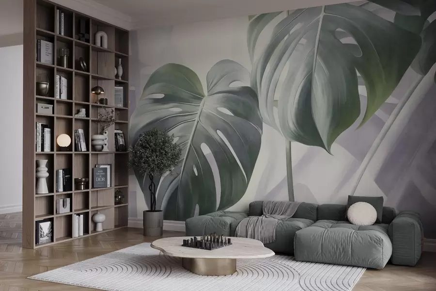 Fotobehang Getextureerde monstera-bladeren, groot en groen, tegen een zachte, lichte abstracte achtergrond w09477