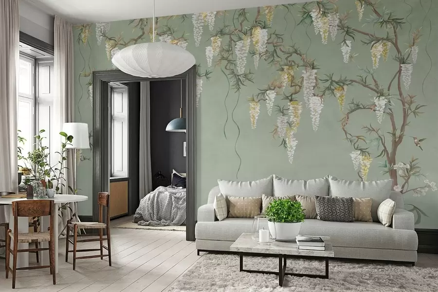 Fotobehang Bloeiende takken met witte bloesems en vogels op een groene achtergrond w05394