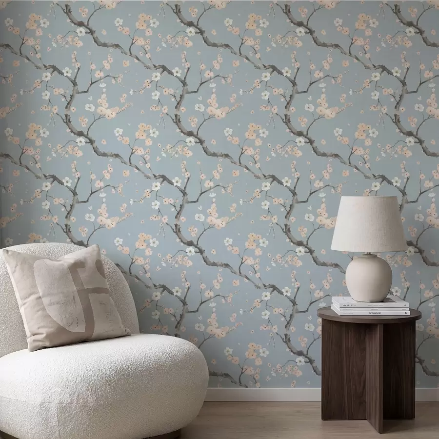 Fotobehang Takken met bloesems op een blauwe achtergrond a01155