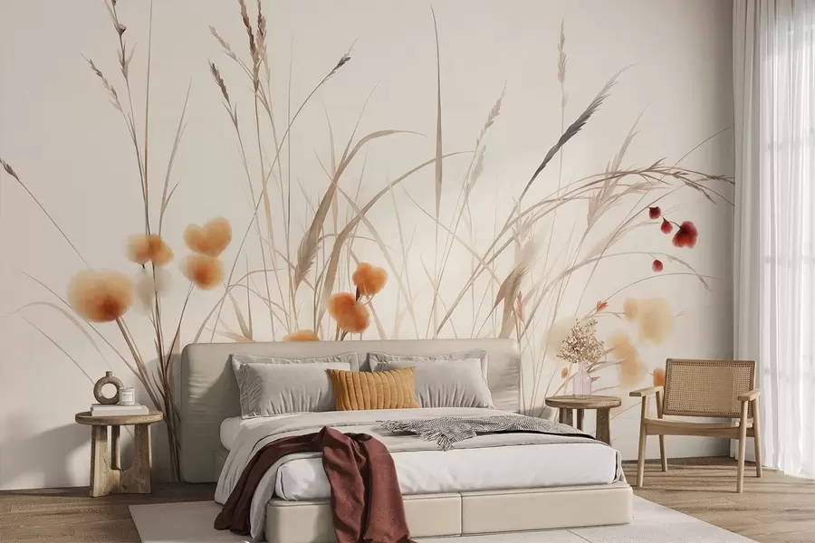 Fotobehang Hoog gras en kleine oranje wilde bloemen tegen een bleke achtergrond, in een boho-stijl met veel textuur w09902