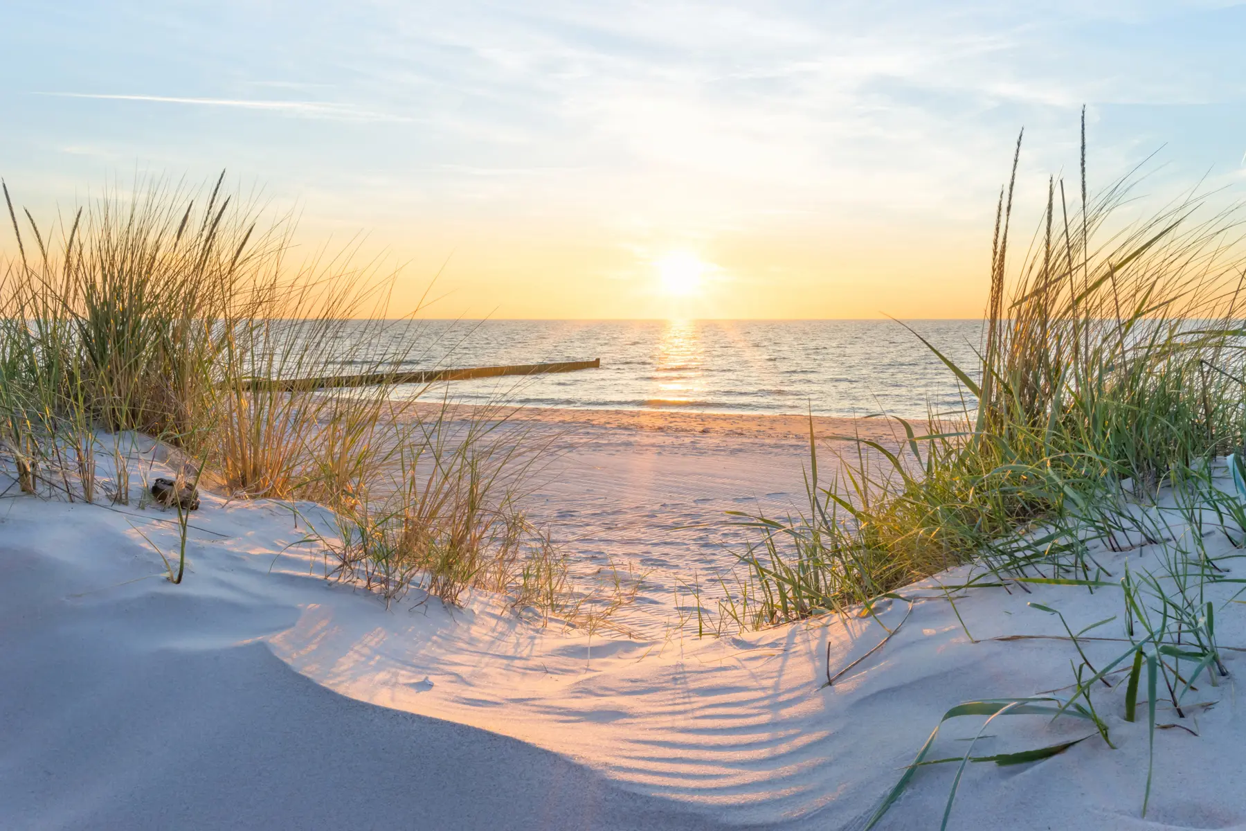 Fotobehang Foto/panoramisch strand met zonsondergang u93577